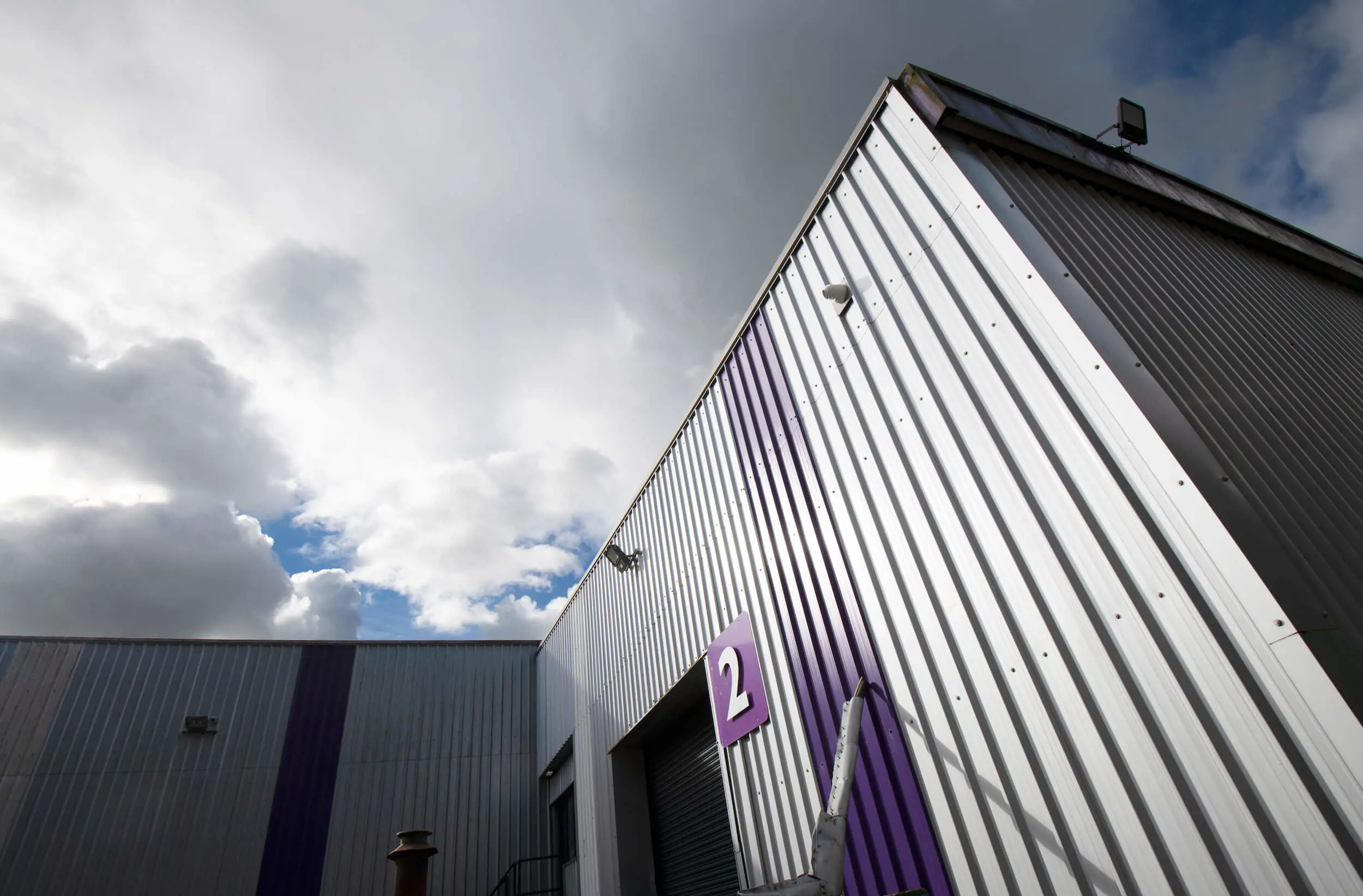 Capital Coated Steel HQ, picture shows warehouse set against blue sky